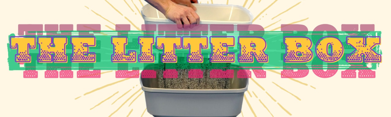 A litter box being scooped